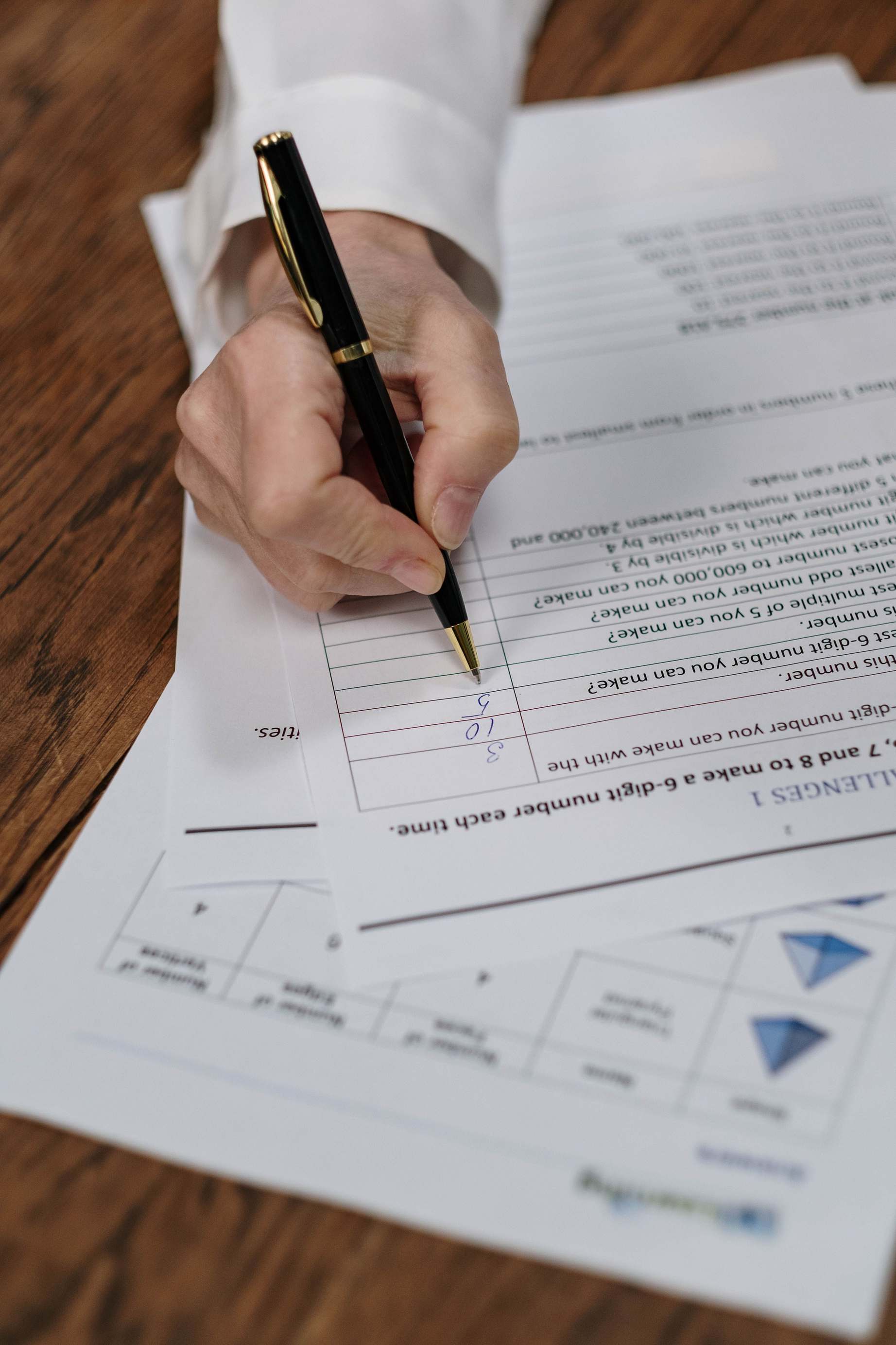 Close-up of financial documents and a spreadsheet